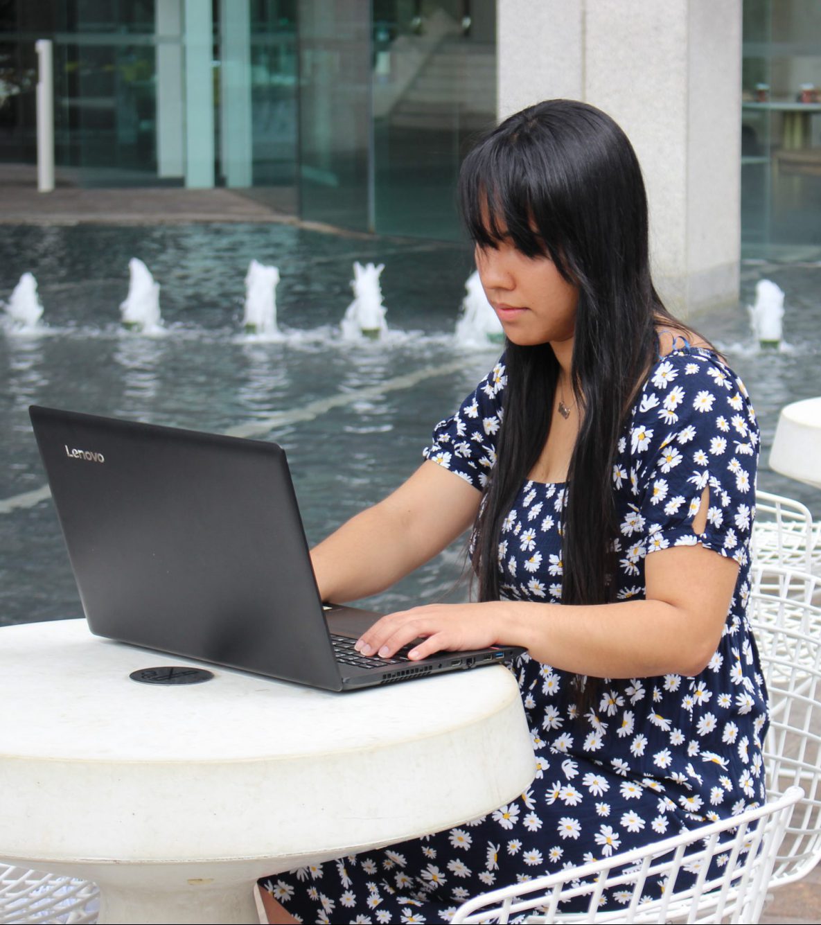Sarina Russo Institute student studying outside